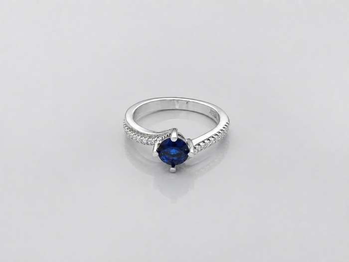 Silver Blue Round Solitaire Twist Ring