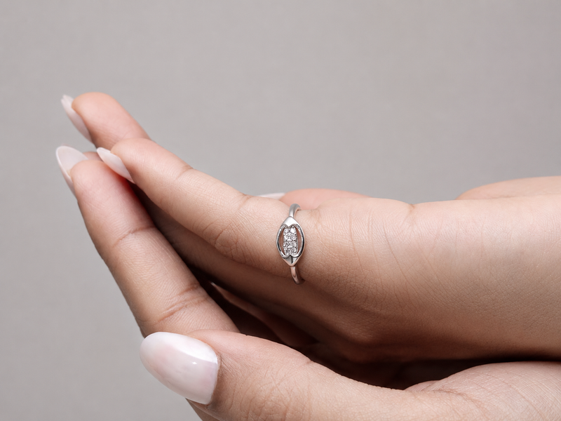 Silver Oval Bezel Three-Stone Ring